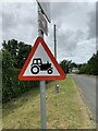 Farm vehicles in road warning sign, Abergwyngregyn in LL33 0LE