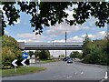 Covered footbridge over Damson Parkway in B92 9EP