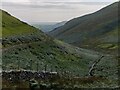 Dry stone wall and valley in LL36 9UE