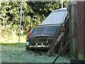 Old Morris car abandoned behind a shed in SY4 4EW