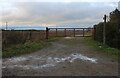 Field entrance with path in Newney Green in CM1 3SQ