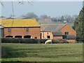 Farm outbuildings at Halghton Hall in LL13 0BN