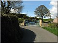 Blind bend in the road by the gate to Tan-yr-Allt Farm in LL62 5RD