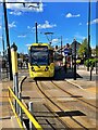 Metrolink tram approaching the Audenshaw tram stop in M34 5NG