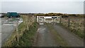 The gate into the nature reserve in Llanfair-yn-Neubwll Community