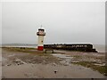 Haverigg lighthouse on a stormy winter day in LA18 4LG