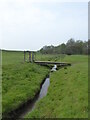 Footbridge over a small stream in CV7 7LG