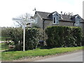Signpost by Oakdene Cottage in SN15 5HG