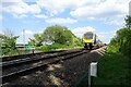 Train approaching Barrowby Lane crossing in LS25 1NF