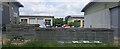 Industrial estate, Peasmarsh, from the railway in GU3 1JR