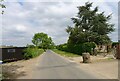 Arnesby Road passing Glebe Meadow, Glebe Barn, and Glebe Farm in LE8 8AQ