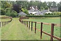 Fenced path descending into Redenham in SP11 9AW