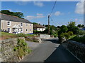 Crellow Hill, Stithians, with houses and power and telephone lines in TR3 7BD