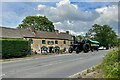 Traction engine in front of the Talbot in OX29 4TN
