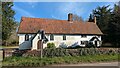 Coldham Cottage and the Roman Catholic Church of Our Lady Immaculate and St Joseph in IP29 4PL