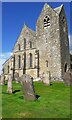 St Cuthbert's Church and grave stones in CA7 2DQ