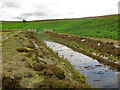 Catchwater by the dam of Hisehope Reservoir in Muggleswick
