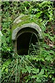 A small font at the grotto in the grounds of St Mary Immaculate, Whittingham in NE66 4SY
