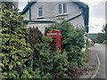Overgrown telephone kiosk in Potter Brompton in YO12 4PF