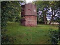 Brick built doocot with sandstone bands in FK2 8HQ
