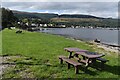 Picnic table on the shore at Lazaretto Point in PA23 8QJ