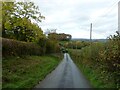 Lane approaching 'the roundabout' in SY15 6LW