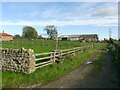 Farm buildings and footpath in HG5 8PA