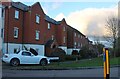 Houses on the corner of Childs Way and Harlow Crescent in MK4 4EL