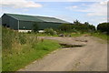 Farm buildings above Higher Muddiford in EX31 4ED