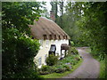 Cottages near the river Avill in Dunster in TA24 6RT