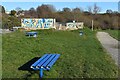 Skate park and blue benches in Bourne Valley Park in BH12 4BF