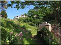 Terraced garden above Peaked Tor Cove in TQ1 2EF