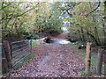 Gated minor road, footbridge and ford crossing Afon Fanagoed in Cynwyl Gaeo Community