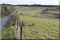 Sloping fields above the River Bourne in SP4 0HZ
