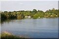 Looking across Ellingham Lake at the water ski club buildings in BH24 3PE