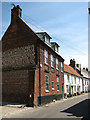 C18 houses lining High Street in Wiveton