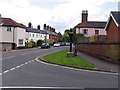 Road from St Margaret's Church, Catton, Norfolk in NR6 7LJ