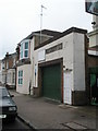 Former garage in Milton Road in PO3 6PD