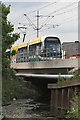 Tram crossing the River Leen in NG5 1NN