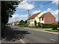 View west along Aylsham Road (B1145) in Felmingham