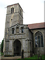 St Giles' church - porch and tower in NR11 7ES