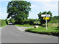 Road junction on a lane to the NE of Hullavington in SN14 6QP