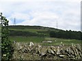Farmland, buildings, Scotson Hill beyond in DD3 0QT