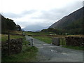 Farm track with cattle grid in LL55 4NH