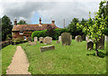 Path through the churchyard in Foxley