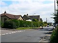 Junction of The Close and The Street, Lydiard Millicent in SN5 3LU