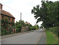 View north along The Street in NR20 5LF