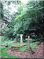 St Nicholas' church - graves by the east wall in NR20 5LY