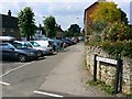 Manor Lane junction with High Street, Shrivenham in SN6 8HD