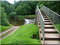 Footbridge and weir , River Eden, Appleby in CA16 6SY